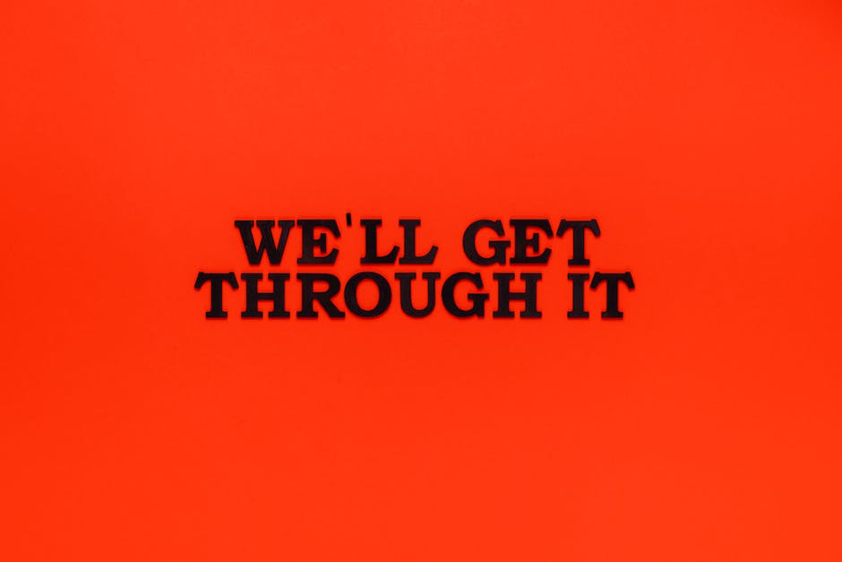 Motivational phrase on a bright red background to uplift and inspire.